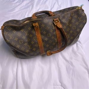 LOUIS VUITTON TRAVEL BAG